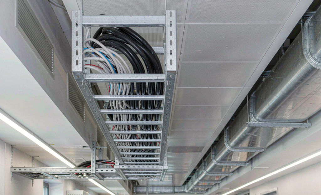 Steel cable tray supporting electrical cables in a building